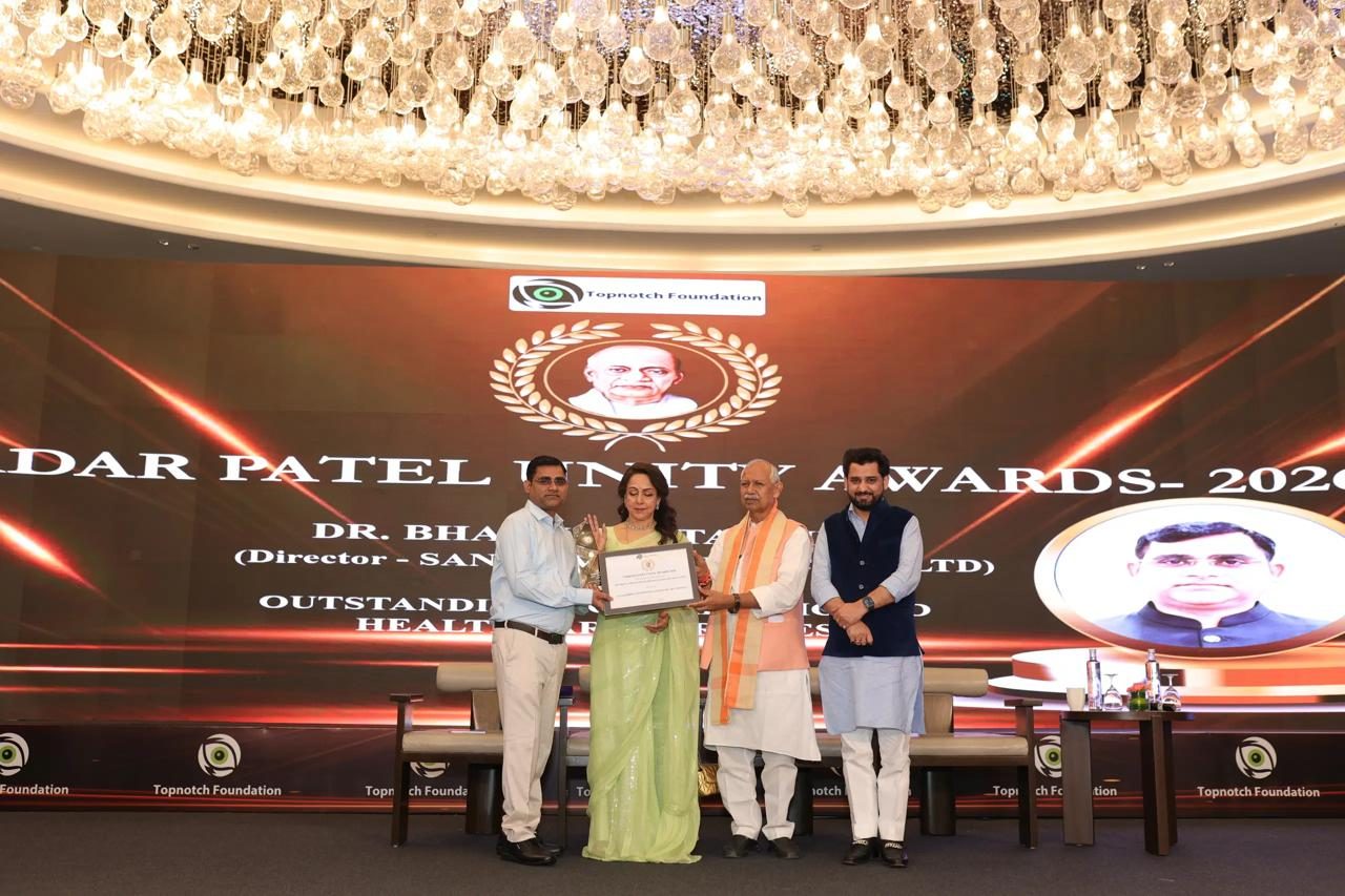 Award being handed over on stage