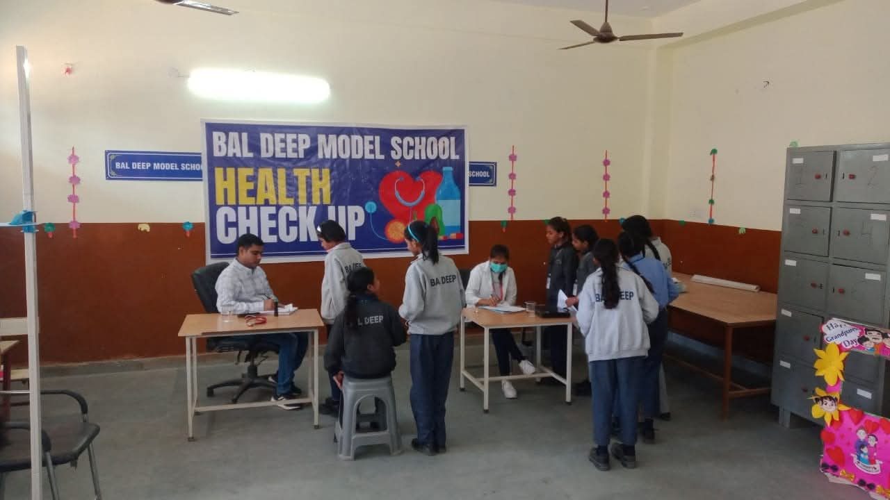 Bal Deep Model School health check-up in the hall